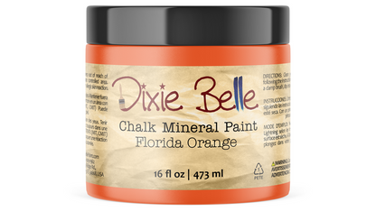Jar of Dixie Belle Chalk Mineral Paint in Florida Orange on a white background
