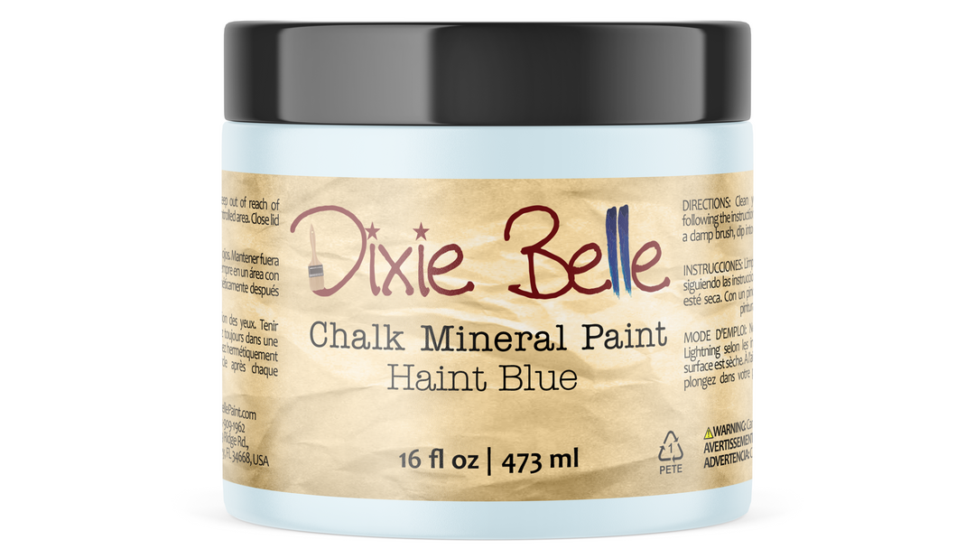 A 16 fl oz jar of Dixie Belle Chalk Mineral Paint in the color Haint Blue, featuring a black lid and a beige textured label.