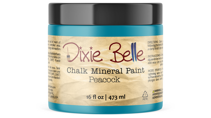 Jar of Dixie Belle Chalk Mineral Paint in Peacock color on a white background