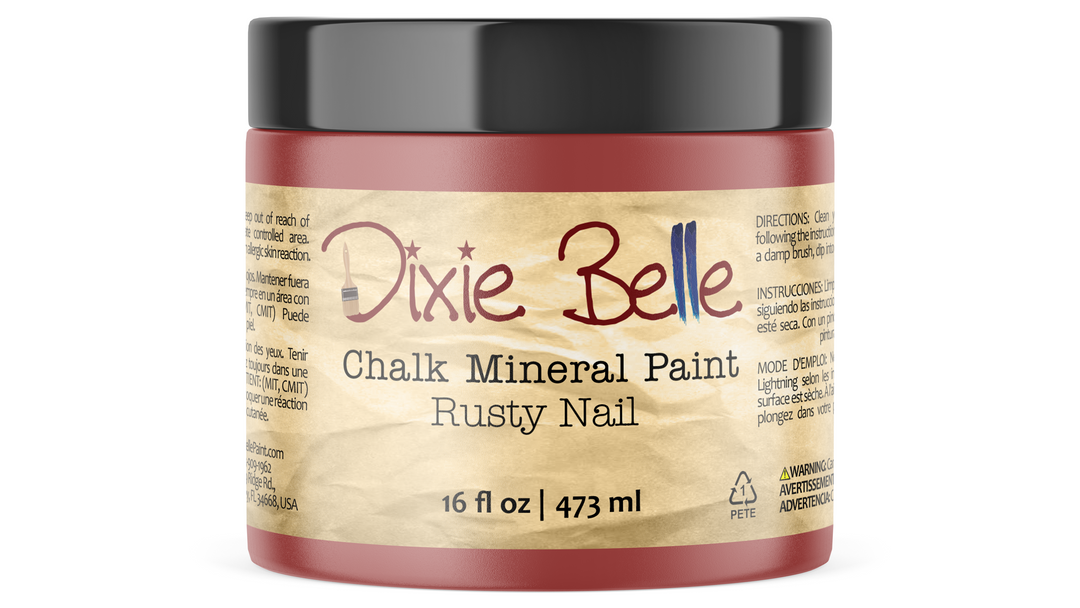 Jar of Dixie Belle Chalk Mineral Paint in Rusty Nail color on a white background