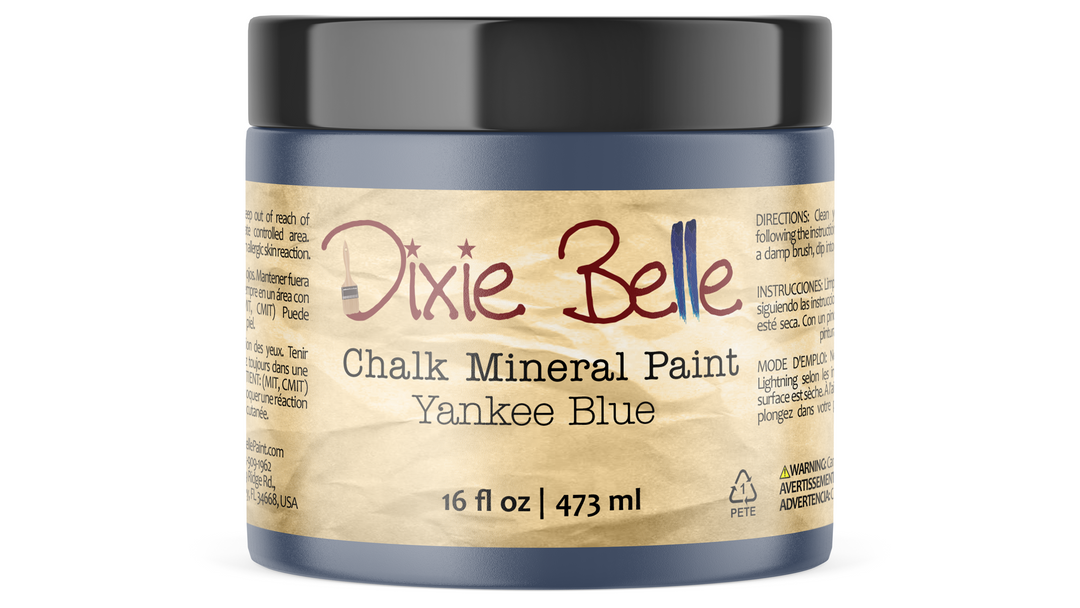 Jar of Dixie Belle Chalk Mineral Paint in Yankee Blue on a white background