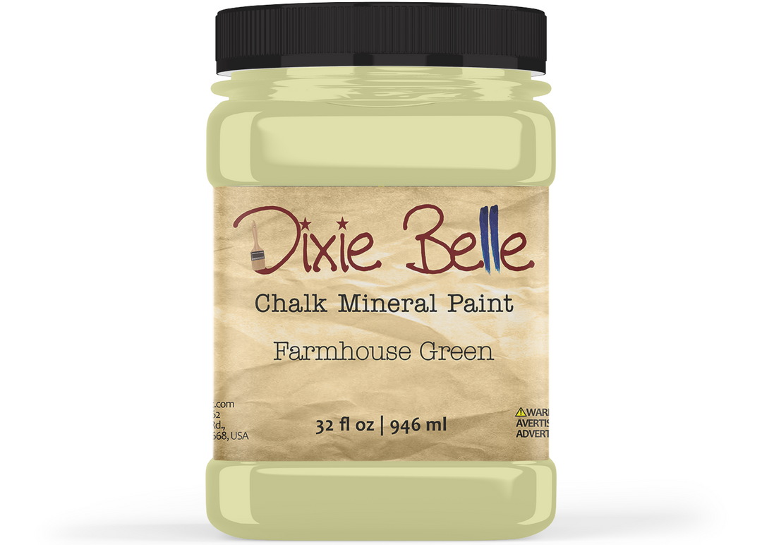 A jar of Dixie Belle Chalk Mineral Paint in the color 'Farmhouse Green' with a black lid and a beige label, shown on a white background.
