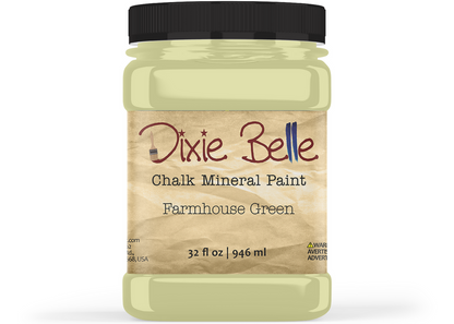 A jar of Dixie Belle Chalk Mineral Paint in the color 'Farmhouse Green' with a black lid and a beige label, shown on a white background.