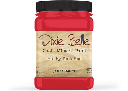 Jar of Dixie Belle Chalk Mineral Paint in Honky Tonk Red on a white background