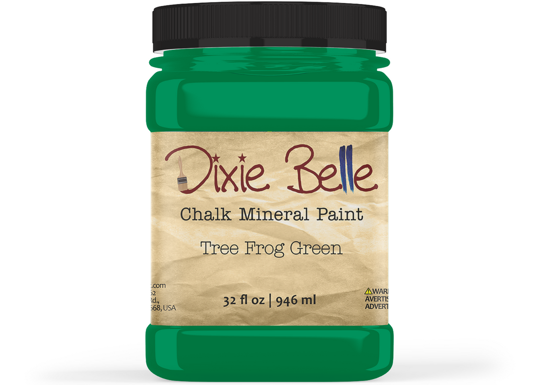 Jar of Dixie Belle Chalk Mineral Paint in Tree Frog Green on a white background