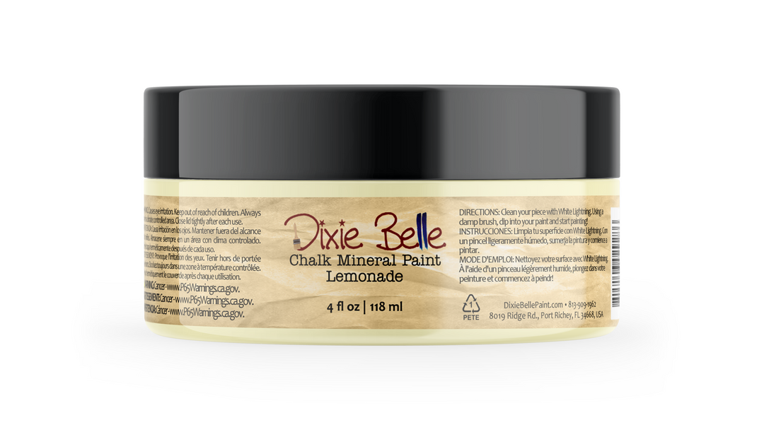 A 4 fl oz jar of Dixie Belle Chalk Mineral Paint in Lemonade, featuring a black lid and a light beige label with red and black text, set against a plain white background.