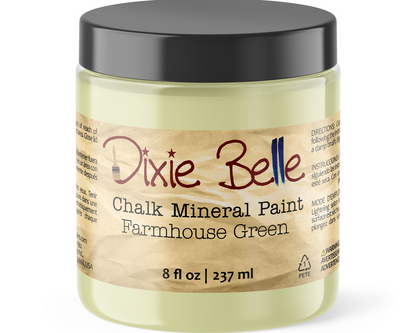 Jar of Dixie Belle Chalk Mineral Paint in farmhouse green on a white background