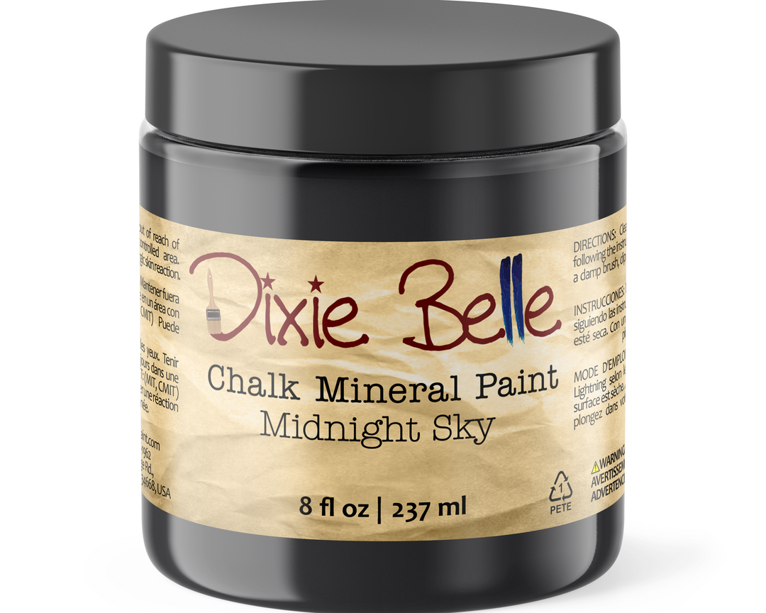 Jar of Dixie Belle Chalk Mineral Paint labeled 'Midnight Sky' on a white background