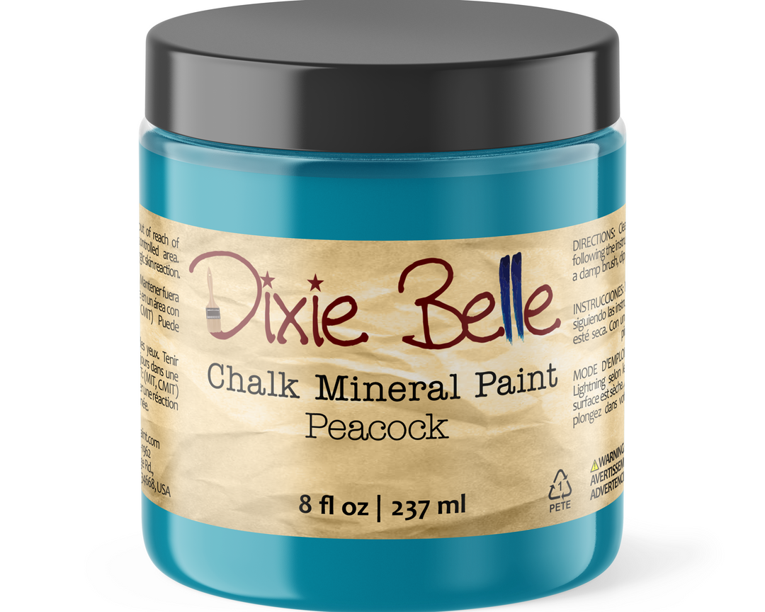 Jar of Dixie Belle Chalk Mineral Paint in Peacock color on a white background