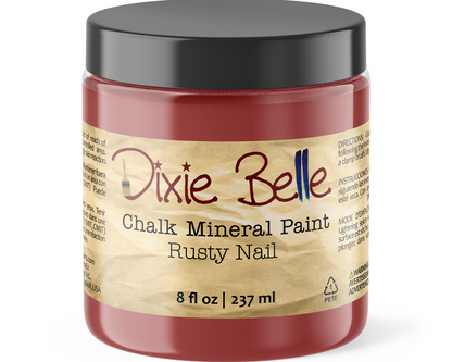 Jar of Dixie Belle Chalk Mineral Paint in Rusty Nail color on a white background