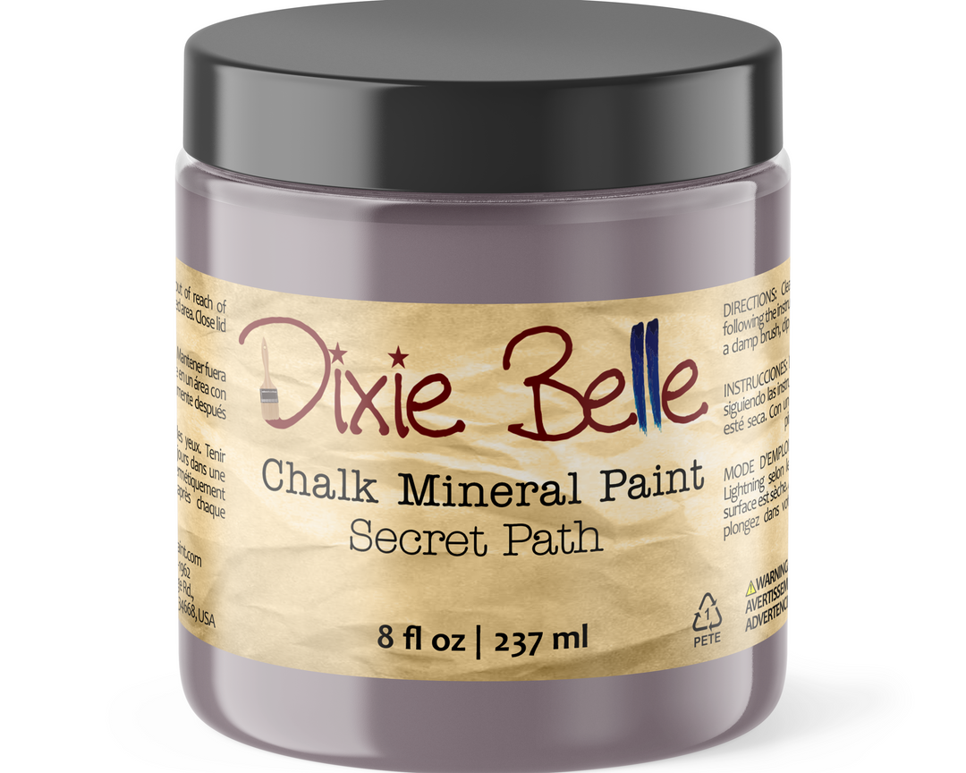 Jar of Dixie Belle Chalk Mineral Paint in Secret Path color on a white background