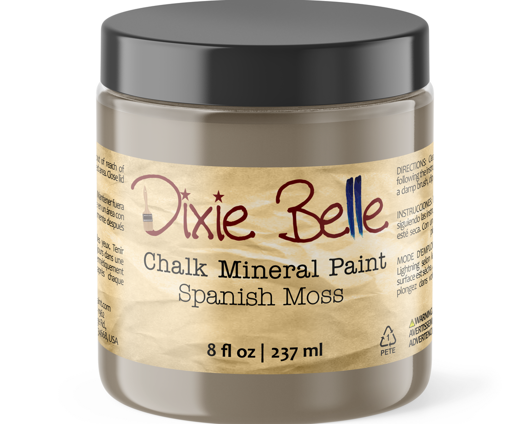 Jar of Dixie Belle Chalk Mineral Paint in Spanish Moss color on a white background