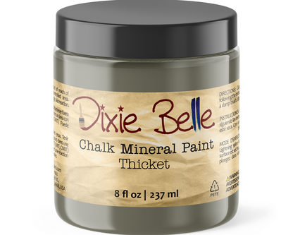Jar of Dixie Belle Chalk Mineral Paint in Thicket color on a white background