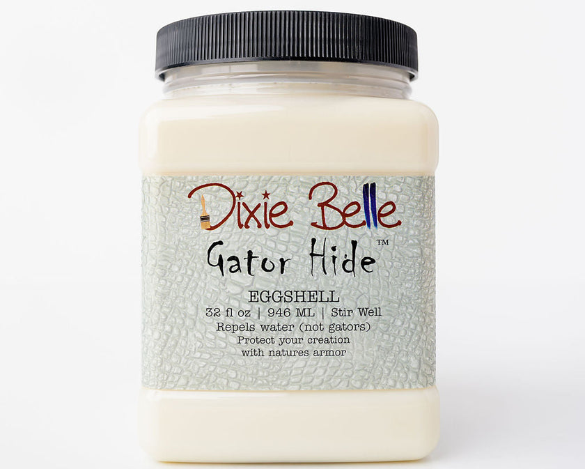 A jar of Dixie Belle Gator Hide Eggshell resin, featuring a black ribbed screw cap and a textured light gray label with the brand name and product details.