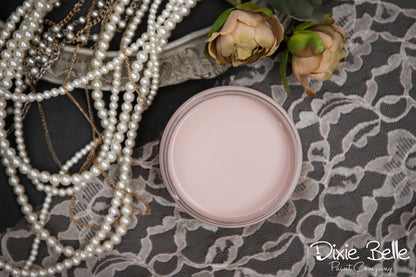 Dixie Belle Paint color Tea Rose with pearls and flowers on a lace fabric background