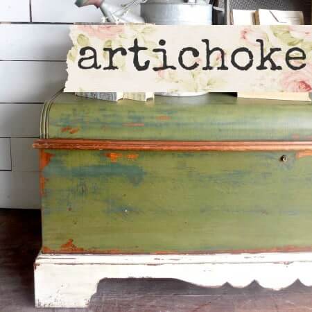 Vintage trunk with 'artichoke' sign on top
