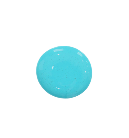 a drop of bleu bohemia milk paint on a plain white background.