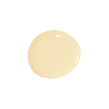 A drop of butter paint on a solid white background.