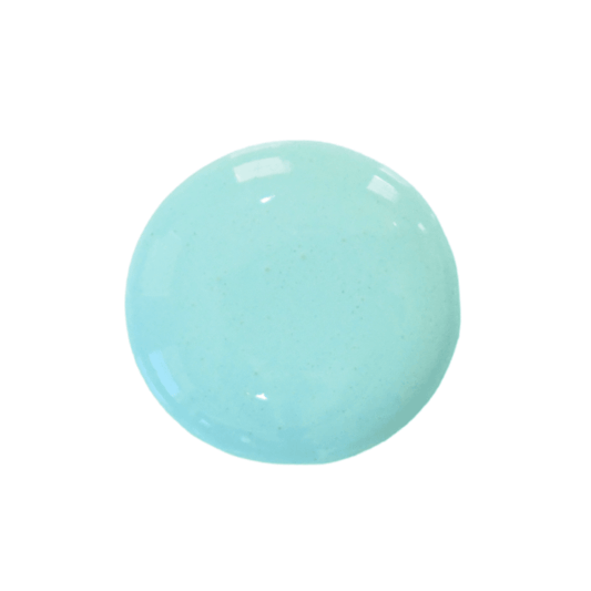 A drop of Capri milk paint on a plain white background.