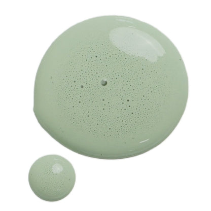 a drop of cheshire milk paint on a white background