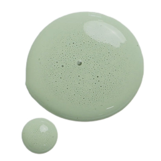 a drop of cheshire milk paint on a white background