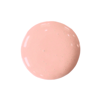 a drop of corabelle milk paint on a solid white background.