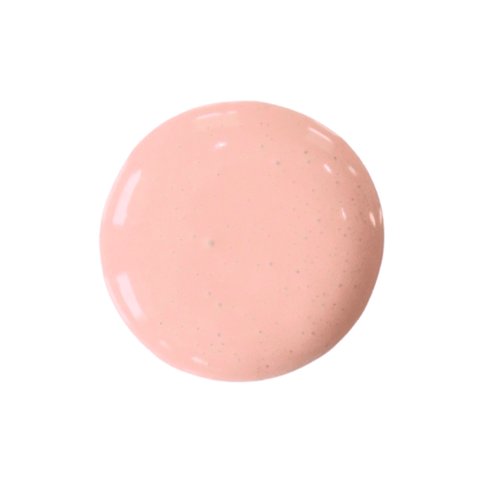 a drop of corabelle milk paint on a solid white background.
