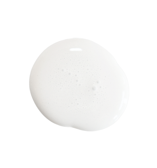 a drop of flour sack milk paint on a white background