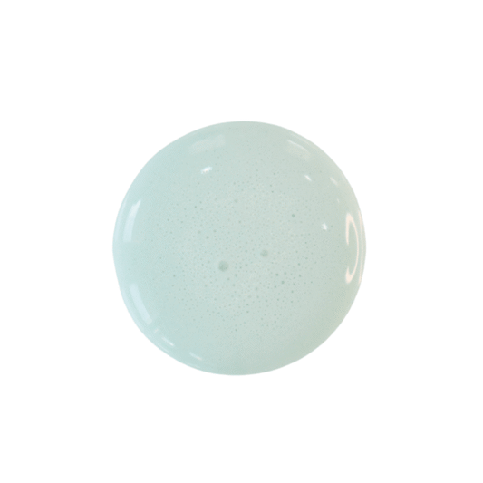 a drop of harbor milk paint on a plain white background.