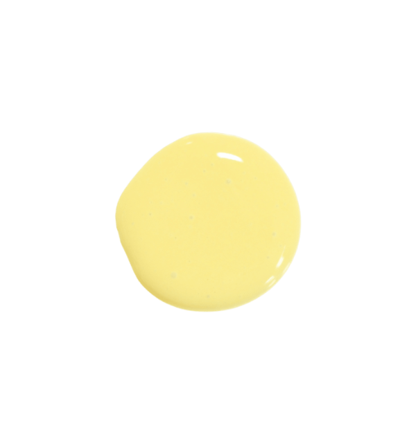 a drop of lemon drop milk paint on a solid white background.