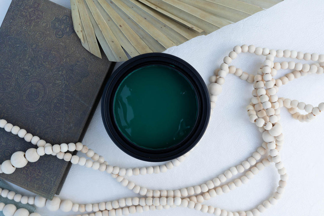 Malachite Terra Clay Paint on a white surface with decorative elements