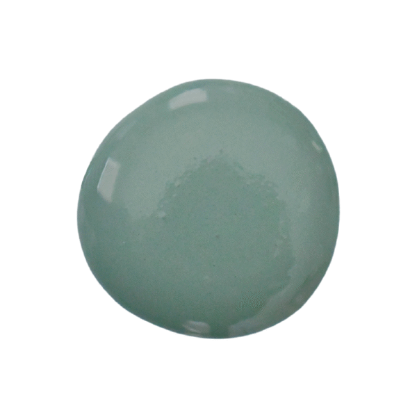 a drop of ocean milk paint on a white background