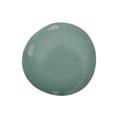 a drop of ocean milk paint on a white background