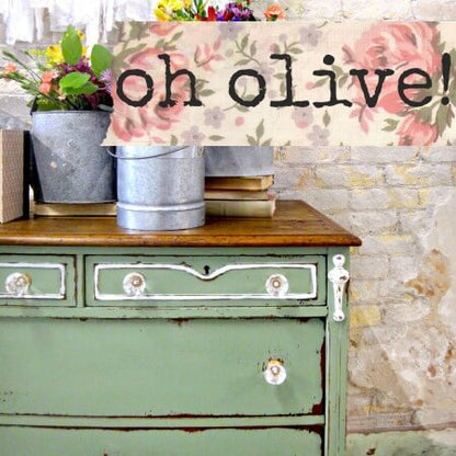 Vintage green dresser with wooden top against a floral-themed background with 'oh olive!' text.