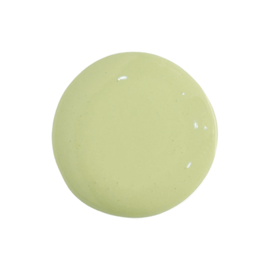 a drop of oh olive milk paint on a solid white background.