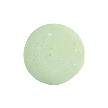 a drop of pantry door milk paint on a solid white background.