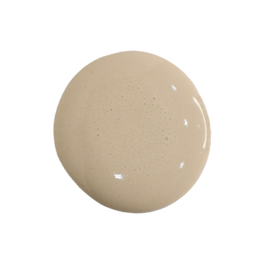 a drop of proper milk paint on a white background