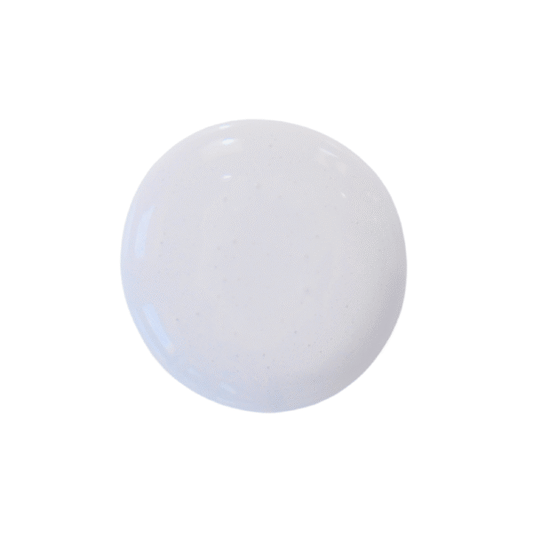 a drop of purple posies milk paint on a solid white background.
