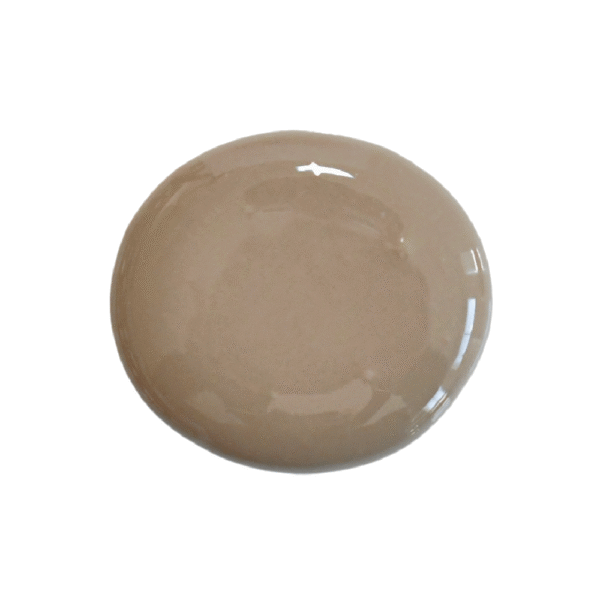 a drop of suitcase milk paint on a white background