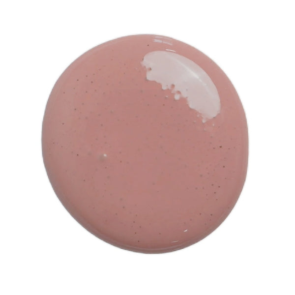 a drop of trellis rose milk paint on a white background