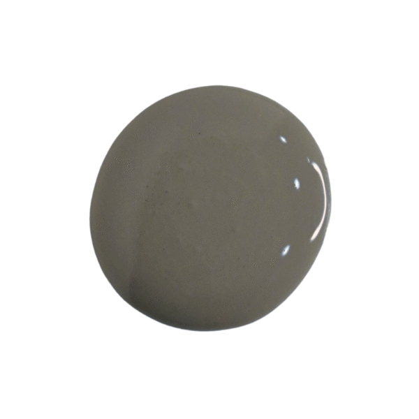 a drop of zinc milk paint on a white background